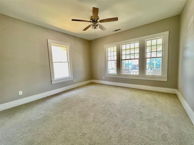 714 Beacon, Dallas, TX 75214 - empty room with baseboards, light colored carpet, and ceiling fan
