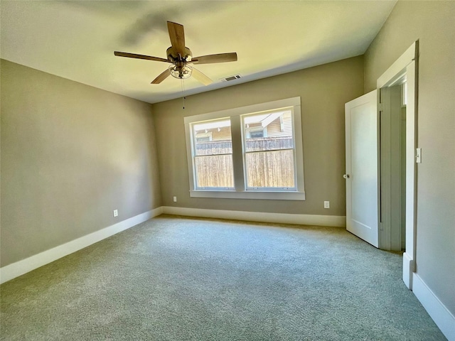 714 Beacon, Dallas, TX 75214 - empty room featuring light carpet, a ceiling fan, and baseboards