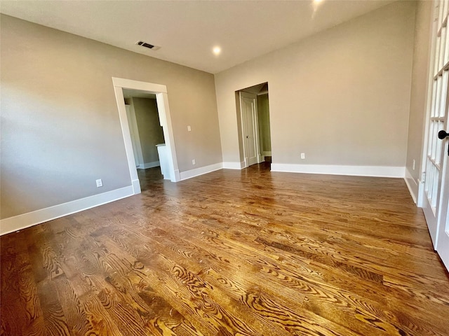 714 Beacon, Dallas, TX 75214 - spare room with dark wood-type flooring and baseboards