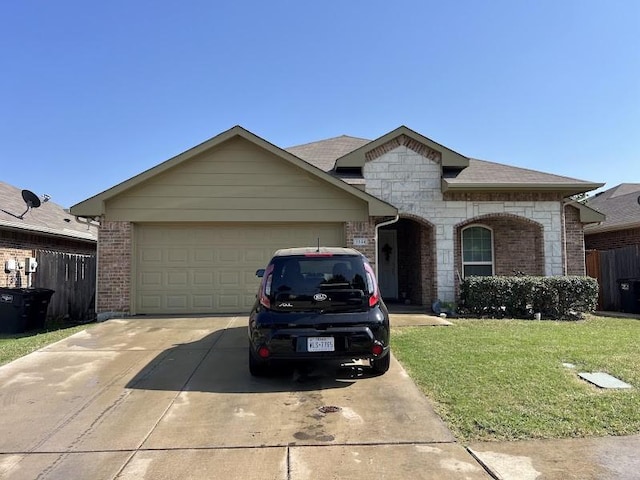 3144 Evangeline Rd, Fort Worth, TX 76140 - french country inspired facade with concrete driveway, a garage, and brick siding