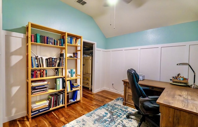 1320 Cedar Branch Dr, Wylie, TX 75098 - home office featuring wood finished floors, lofted ceiling, a decorative wall, wainscoting, and a ceiling fan