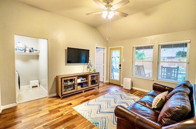 1320 Cedar Branch Dr, Wylie, TX 75098 - living area featuring wood finished floors, ceiling fan, baseboards, and lofted ceiling