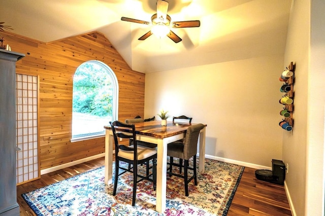 1320 Cedar Branch Dr, Wylie, TX 75098 - dining space featuring wooden walls, vaulted ceiling, a ceiling fan, wood finished floors, and baseboards