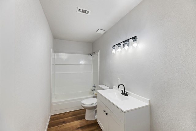 103 Ivy St, Kerens, TX 75144 - full bath with toilet,  shower combination, wood finished floors, and vanity