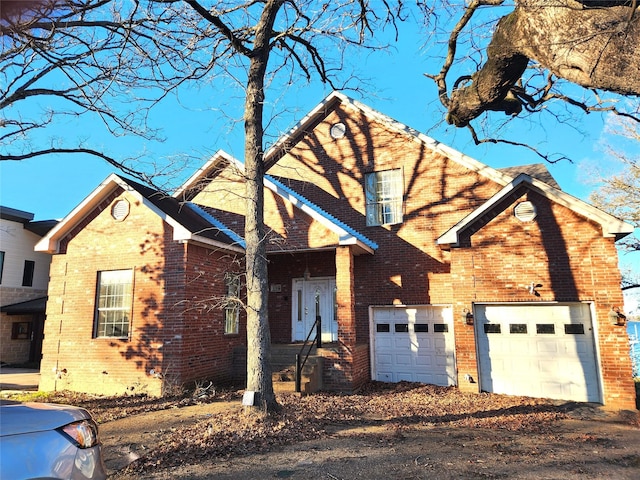 180 Shady Shores Dr, Mabank, TX 75156 - traditional home featuring brick siding, an attached garage, and driveway