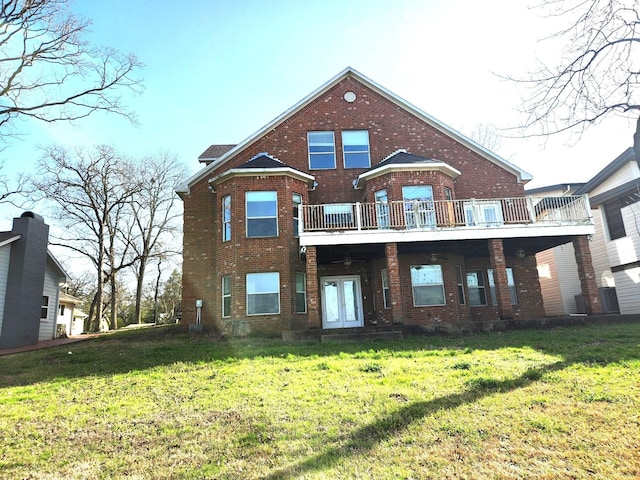 180 Shady Shores Dr, Mabank, TX 75156 - rear view of house featuring brick siding, french doors, a yard, and a wooden deck