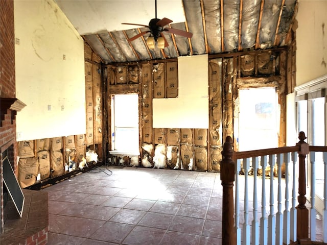 180 Shady Shores Dr, Mabank, TX 75156 - kitchen featuring a ceiling fan, high vaulted ceiling, and a fireplace