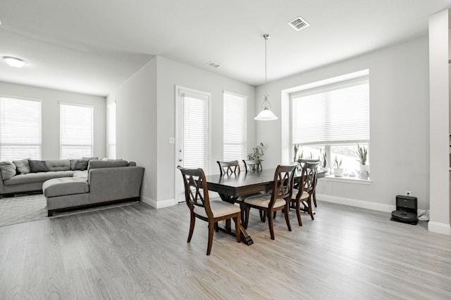 1302 Canyon Creek Rd, Wylie, TX 75098 - dining space featuring light wood finished floors, baseboards, and plenty of natural light