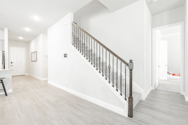 1302 Canyon Creek Rd, Wylie, TX 75098 - stairway with wood finished floors, baseboards, and recessed lighting