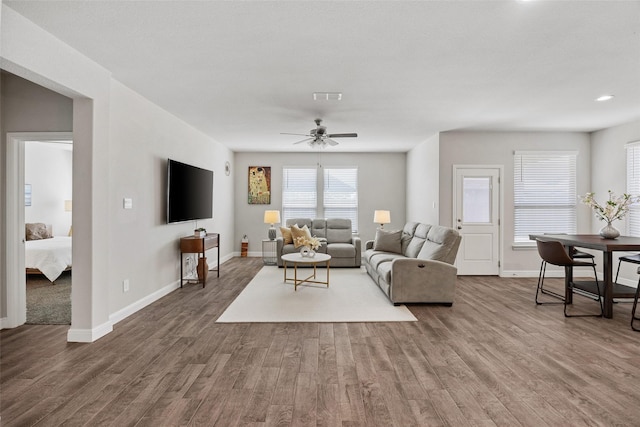 15532 Balham Pass, Fort Worth, TX 76247 - living area featuring wood finished floors, baseboards, and a ceiling fan