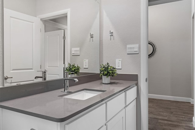 15532 Balham Pass, Fort Worth, TX 76247 - bathroom with vanity, wood finished floors, and baseboards