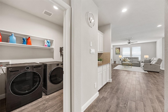 15532 Balham Pass, Fort Worth, TX 76247 - laundry room featuring washer and clothes dryer, wood finished floors, a ceiling fan, baseboards, and recessed lighting
