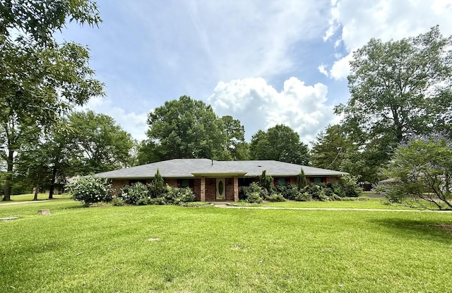 11535 Timber Ridge Dr, Keithville, LA 71047 - ranch-style home with a front lawn and view of scattered trees