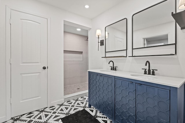 313 Chicken St, Weston, TX 75009 - full bathroom featuring walk in shower, double vanity, tile patterned flooring, and recessed lighting