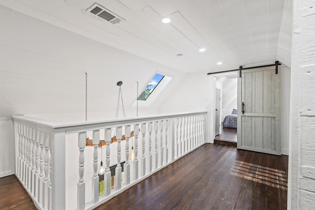 313 Chicken St, Weston, TX 75009 - corridor featuring hardwood / wood-style floors, recessed lighting, and a barn door