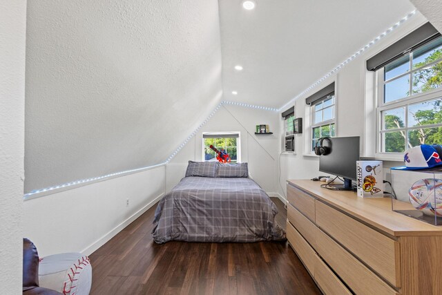 313 Chicken St, Weston, TX 75009 - bedroom with dark wood finished floors, multiple windows, baseboards, vaulted ceiling, and recessed lighting