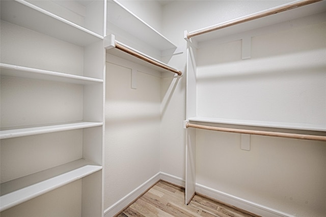 5067 Gaston Ave, Dallas, TX 75214 - spacious closet featuring light wood-type flooring