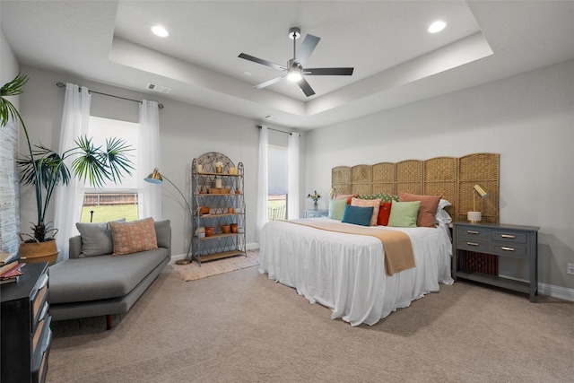 205 Big Creek Loop, Hewitt, TX 76643 - bedroom featuring light colored carpet, a tray ceiling, recessed lighting, baseboards, and a ceiling fan