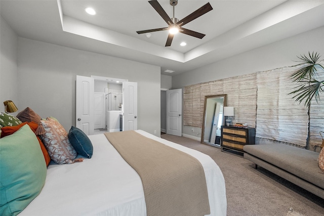205 Big Creek Loop, Hewitt, TX 76643 - carpeted bedroom featuring recessed lighting, connected bathroom, a raised ceiling, baseboards, and a ceiling fan