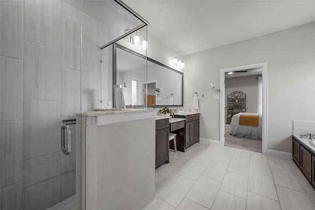 205 Big Creek Loop, Hewitt, TX 76643 - ensuite bathroom with vanity, a shower stall, and baseboards