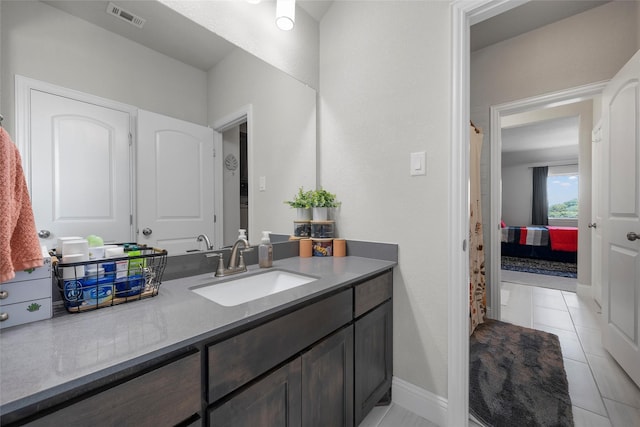 205 Big Creek Loop, Hewitt, TX 76643 - bathroom featuring vanity, tile patterned flooring, and baseboards