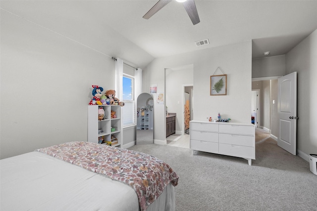 205 Big Creek Loop, Hewitt, TX 76643 - bedroom featuring light colored carpet, baseboards, ensuite bathroom, a ceiling fan, and vaulted ceiling