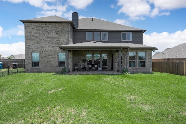 205 Big Creek Loop, Hewitt, TX 76643 - back of property with brick siding, a patio, and a chimney