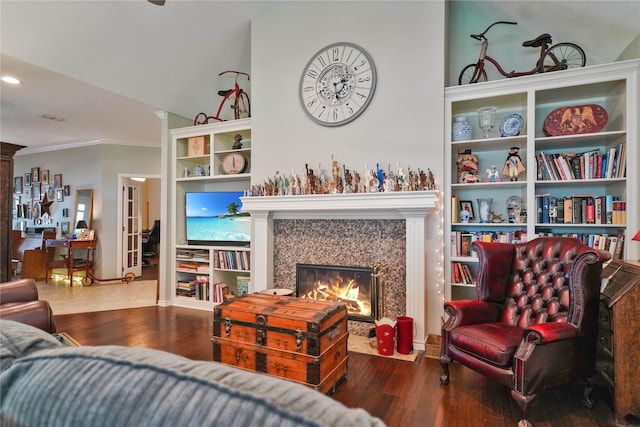 622 Green Meadow Trl, Holly Lake Ranch, TX 75765 - living area featuring ornamental molding, a tiled fireplace, wood finished floors, and recessed lighting