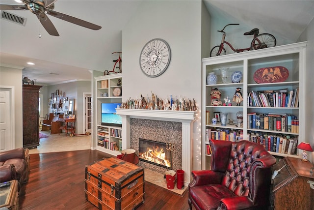 622 Green Meadow Trl, Holly Lake Ranch, TX 75765 - living room featuring vaulted ceiling, ceiling fan, wood finished floors, a fireplace, and recessed lighting