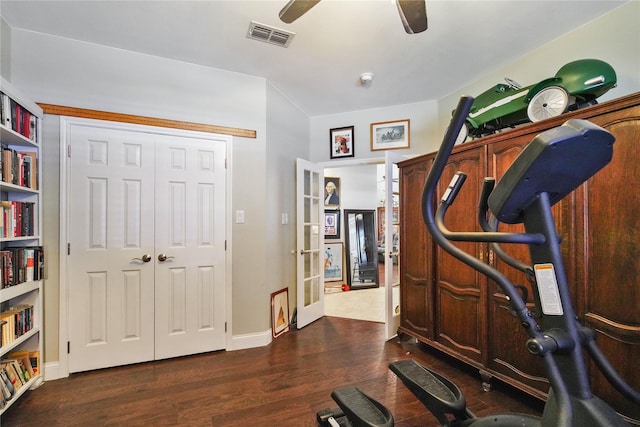 622 Green Meadow Trl, Holly Lake Ranch, TX 75765 - exercise room featuring a ceiling fan and dark wood-style flooring