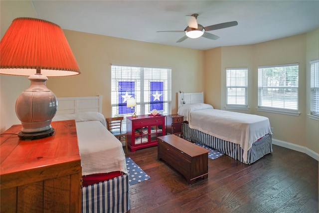 622 Green Meadow Trl, Holly Lake Ranch, TX 75765 - bedroom with wood finished floors, a ceiling fan, and baseboards