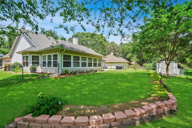 622 Green Meadow Trl, Holly Lake Ranch, TX 75765 - back of house with a chimney and a shingled roof