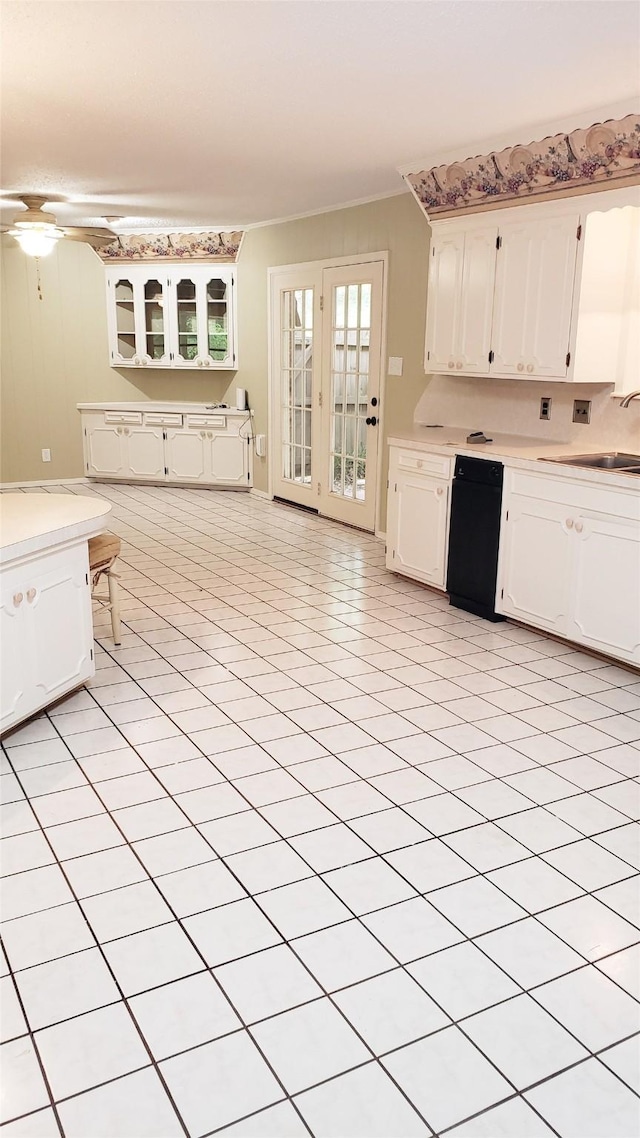 401 S Timberlane, Lone Star, TX 75638 - kitchen featuring a sink, ornamental molding, light countertops, and white cabinetry