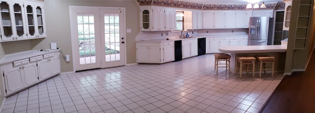 401 S Timberlane, Lone Star, TX 75638 - kitchen featuring stainless steel refrigerator with ice dispenser, dishwasher, a sink, and light countertops
