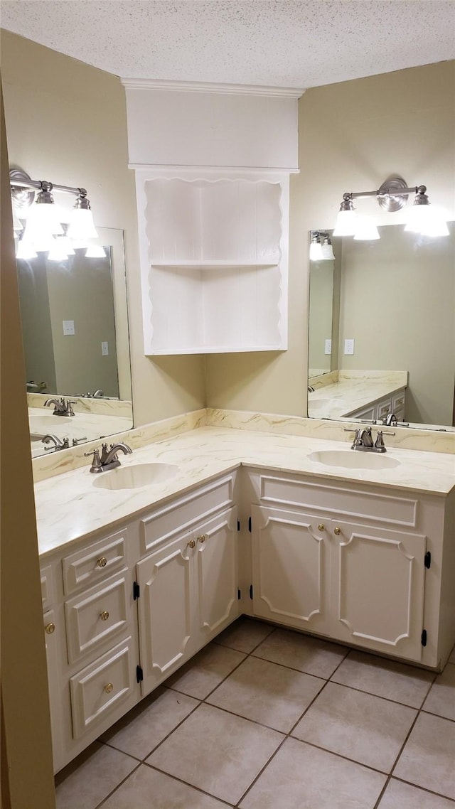 401 S Timberlane, Lone Star, TX 75638 - bathroom with tile patterned floors, vanity, and a textured ceiling
