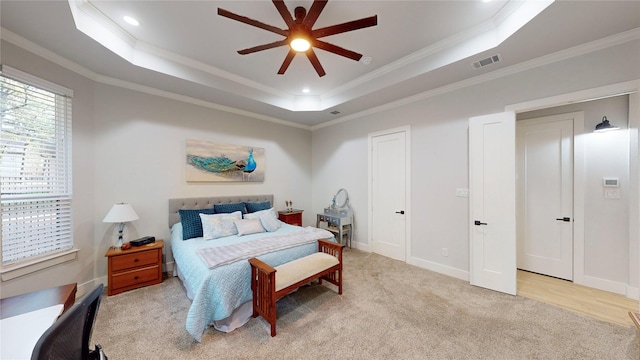 126 Saint Andrews Dr E, Mabank, TX 75156 - bedroom featuring a tray ceiling, ornamental molding, baseboards, light carpet, and recessed lighting