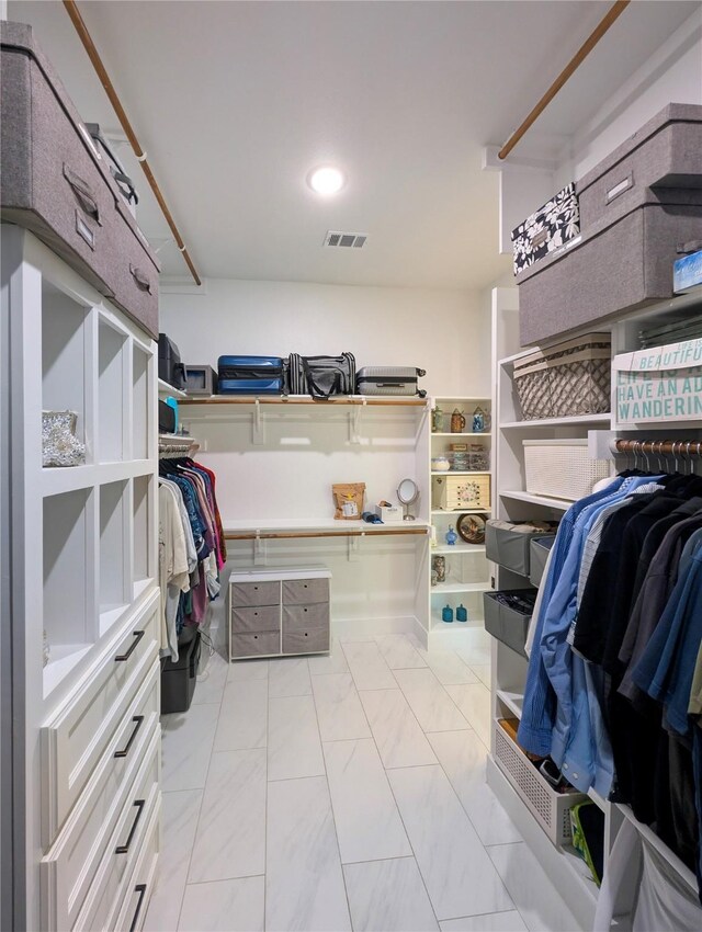 126 Saint Andrews Dr E, Mabank, TX 75156 - walk in closet with light marble finish floors