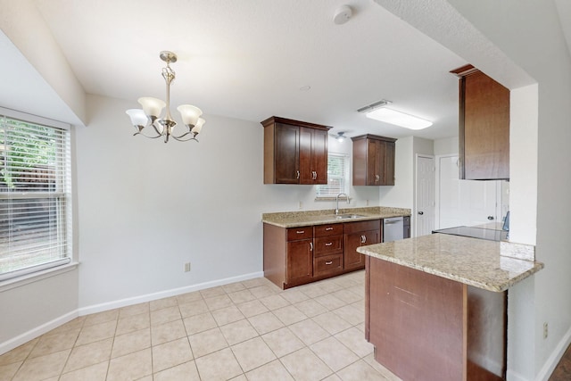 6432 Melinda Ct, Watauga, TX 76148 - kitchen featuring a sink, stainless steel dishwasher, baseboards, and a chandelier