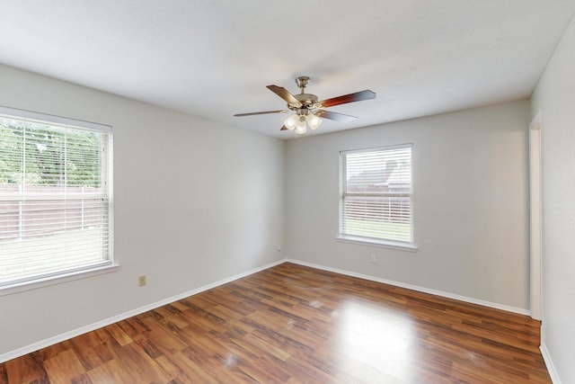 6432 Melinda Ct, Watauga, TX 76148 - spare room featuring wood finished floors, baseboards, and a ceiling fan