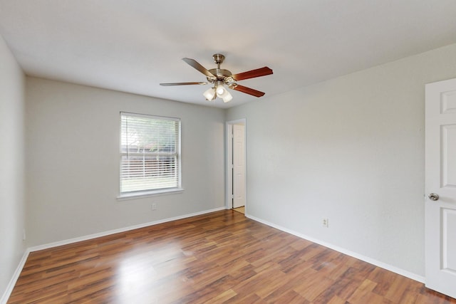 6432 Melinda Ct, Watauga, TX 76148 - unfurnished room with wood finished floors, ceiling fan, and baseboards