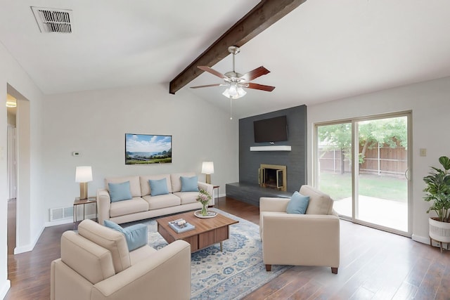 6432 Melinda Ct, Watauga, TX 76148 - living area featuring wood finished floors, ceiling fan, and a brick fireplace