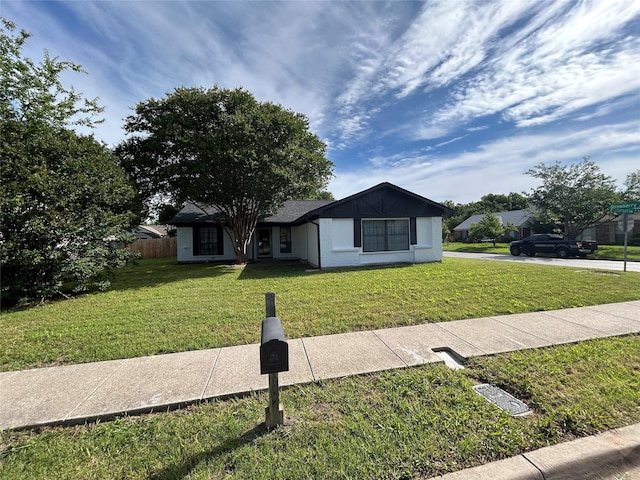3913 Longstraw Dr, Fort Worth, TX 76137 - ranch-style home with a front lawn