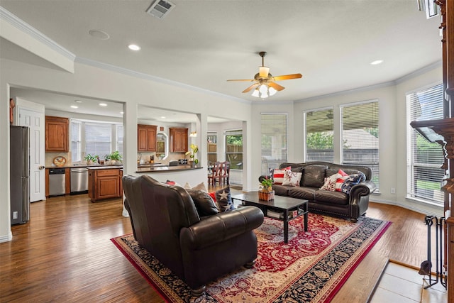 2505 Shoreline Dr, Keller, TX 76248 - living room with plenty of natural light, ornamental molding, a ceiling fan, wood finished floors, and recessed lighting