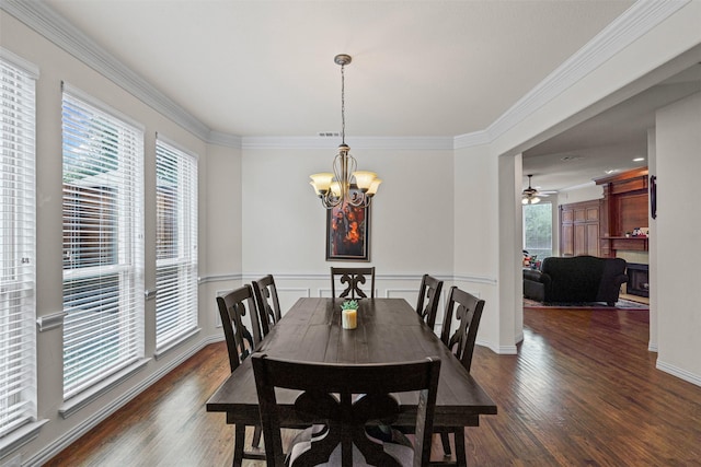 2505 Shoreline Dr, Keller, TX 76248 - dining area with a chandelier, wood finished floors, ornamental molding, and ceiling fan