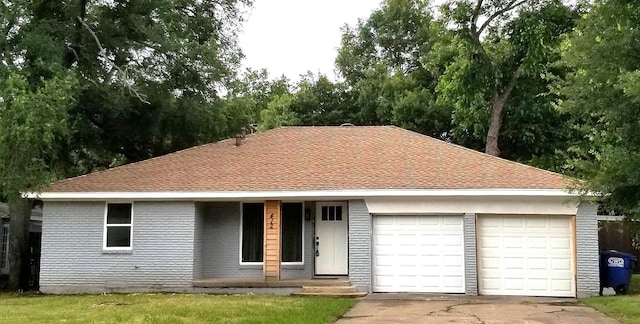 412 Ellis St, Allen, TX 75002 - view of front of home with an attached garage, concrete driveway, brick siding, a shingled roof, and a porch