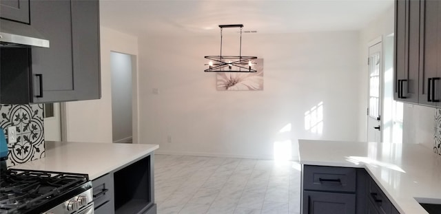 412 Ellis St, Allen, TX 75002 - kitchen featuring exhaust hood, a chandelier, light marble finish flooring, and light countertops