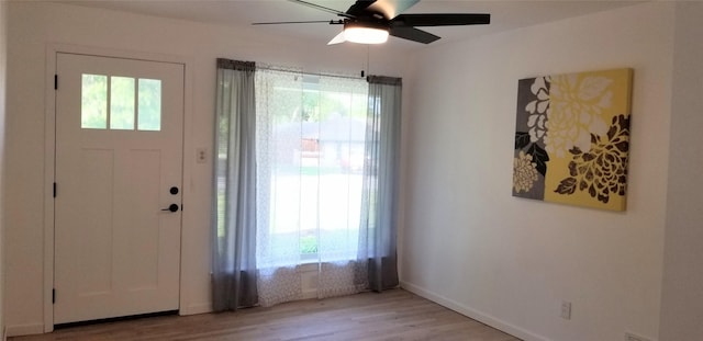 412 Ellis St, Allen, TX 75002 - entryway featuring light wood-type flooring, healthy amount of natural light, ceiling fan, and baseboards