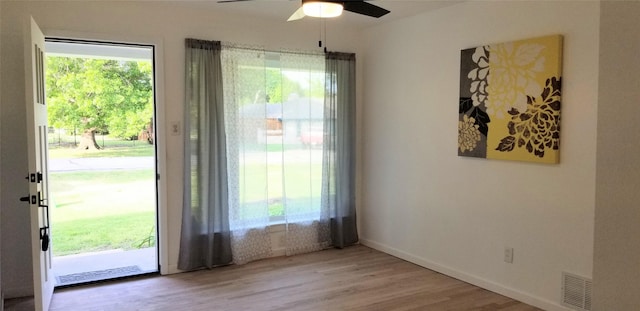 412 Ellis St, Allen, TX 75002 - entryway with a ceiling fan, wood finished floors, and baseboards