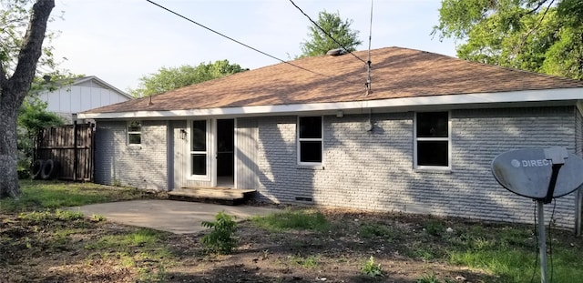 412 Ellis St, Allen, TX 75002 - back of property featuring a shingled roof, crawl space, a patio area, and brick siding