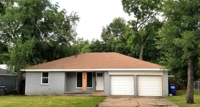 412 Ellis St, Allen, TX 75002 - view of front of home featuring an attached garage, driveway, a front yard, and a porch